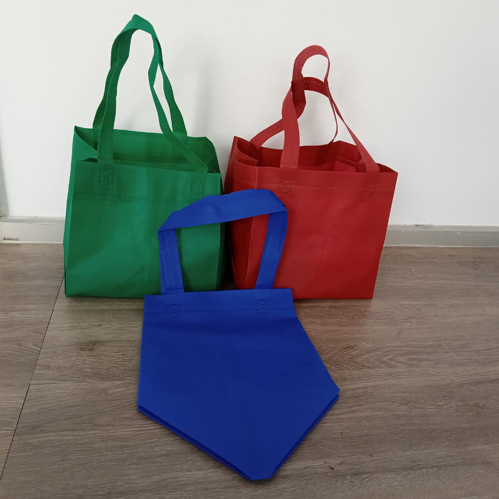 

Tas Kain Spunbond / Goodie Bag Kotak Uk.20x20