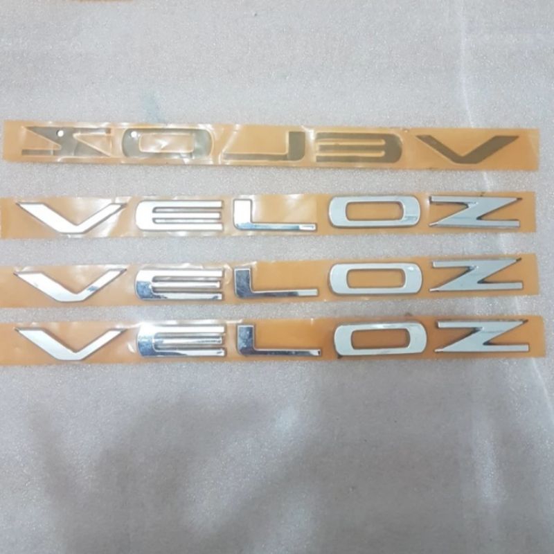 Emblem Depan Kap Mesin Veloz 2022