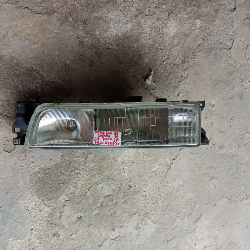 headlamp Mazda 626 Capella kiri