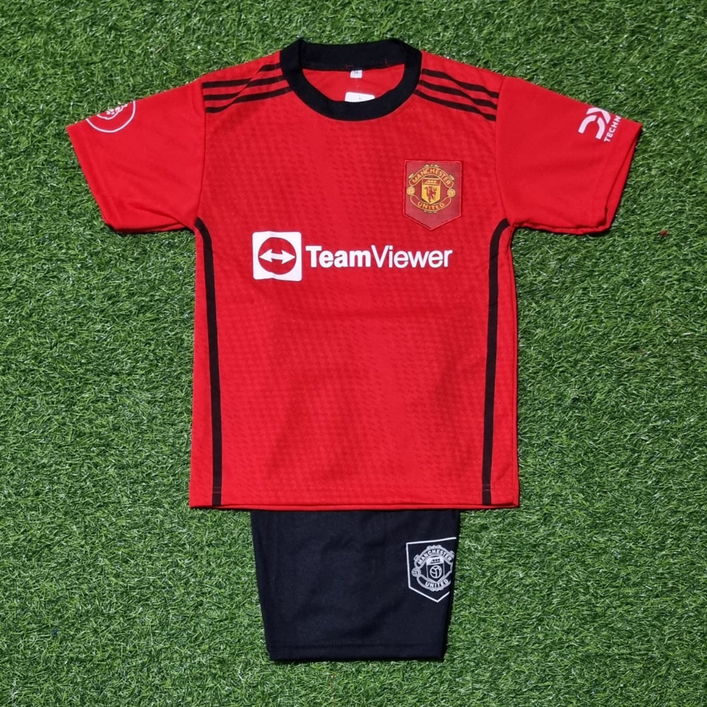 Setelan jersey manchester united bola anak