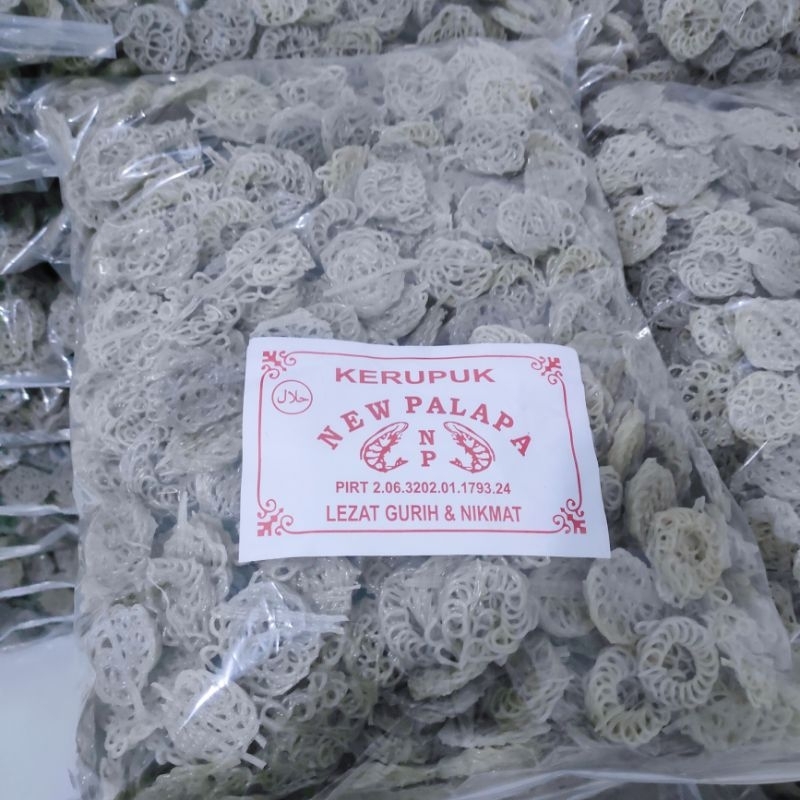 

KERUPUK UDANG MAWAR PUTIH MENTAH KERUPUK UDANG NEW PALAPA LEZAT GURIH KEMASAN 1KG