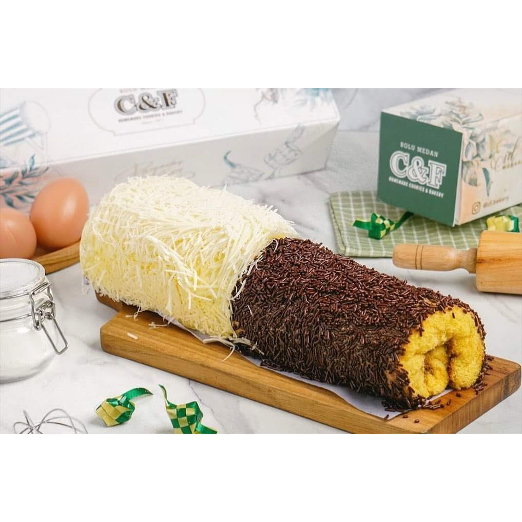 

KUE BOLU GULUNG MEDAN C&F PREMIUM 2 RASA (MOCCA CERES 1/2 DOUBLE KEJU 1/2)