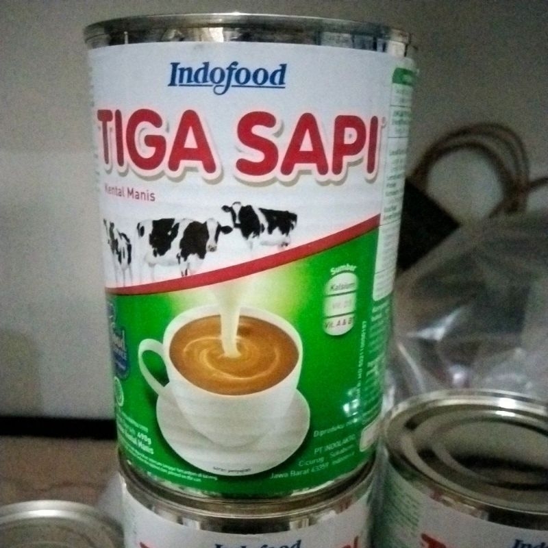 

susu tiga sapi kaleng 490gr