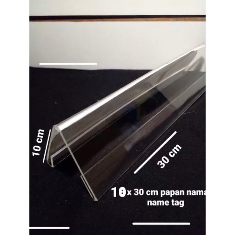 

Akrilik bening papan Nama 2sisi model segitiga uk 10x30cm tebal 2mm