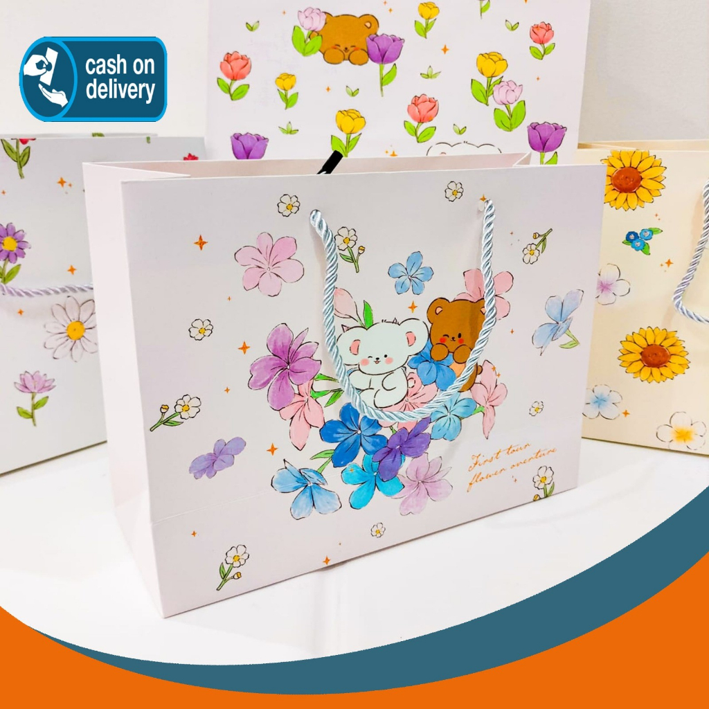 

PAPER BAG BERUANG BUNGA CD-001 UKURAN 22 X 16 X 12 CM KANTONG HAMPERS GOODIE BAG TERMURAH COD