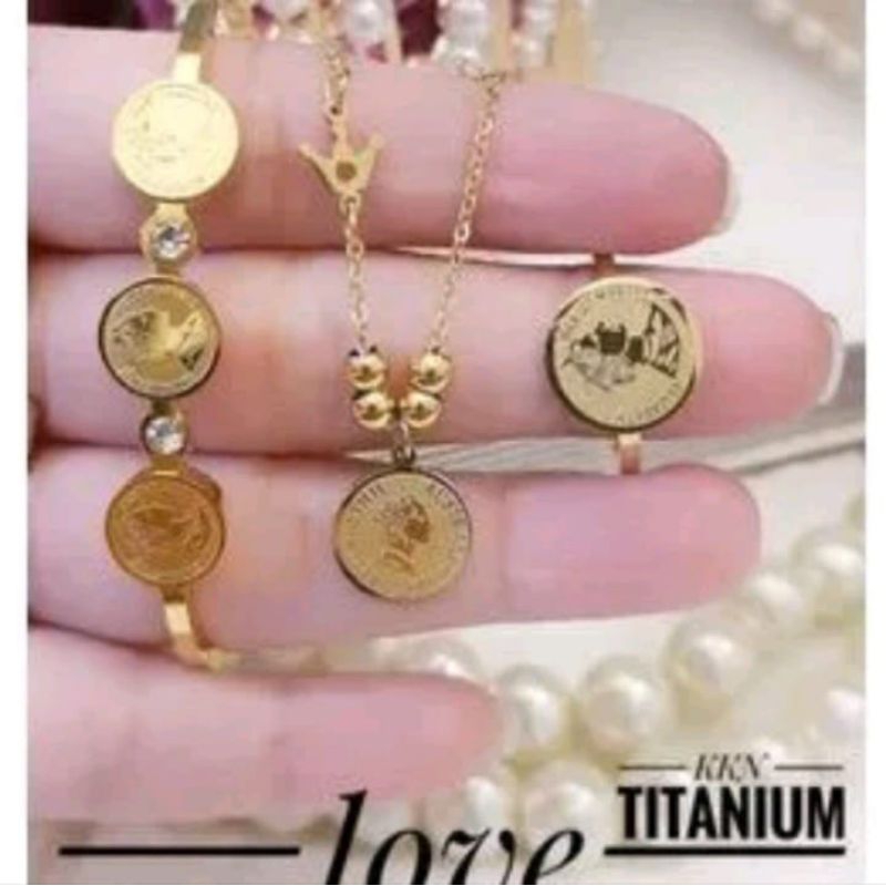 set koin titanium asli lapis emas