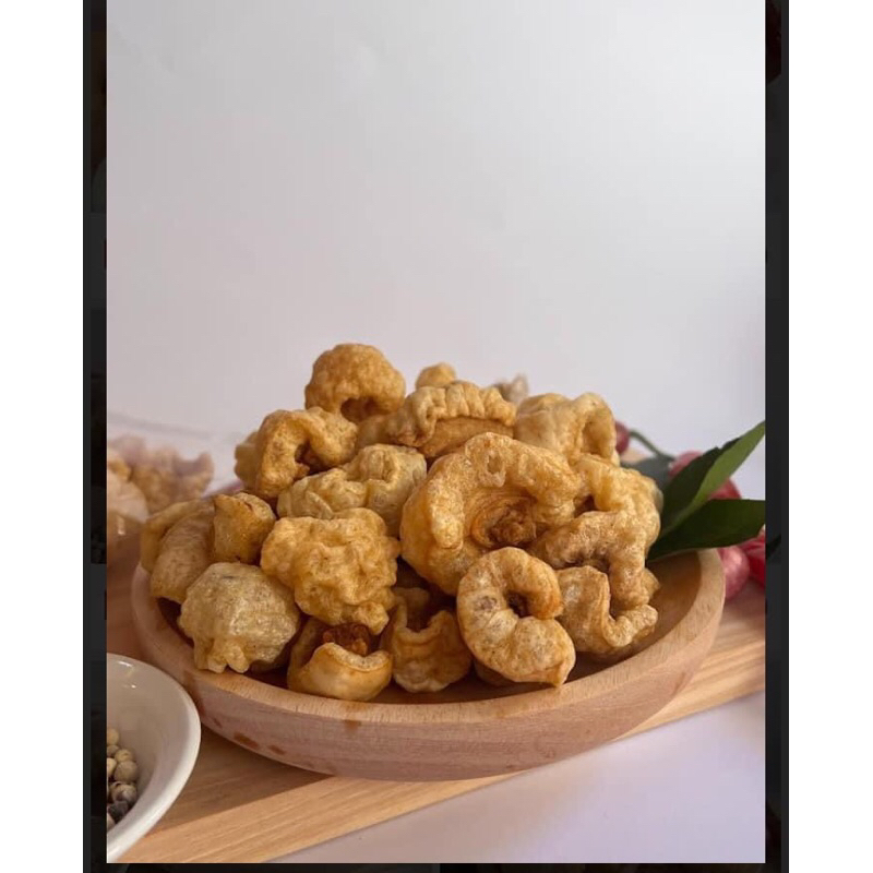 

Kerupuk Rambak Babi Aroma bawang 80gr