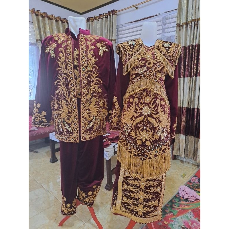 baju penganten minang spasang.