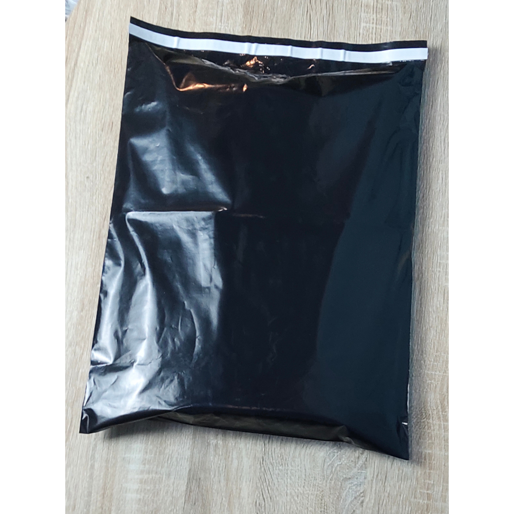 

Plastik Packing Paket 25x35cm Polymailer Bahan PE / Plastik OLSHOP Lem Perekat Hitam Kuat Tebal