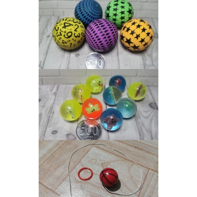 mainan bola bekel mini kecil besar warna bening putih tali basket karet ball