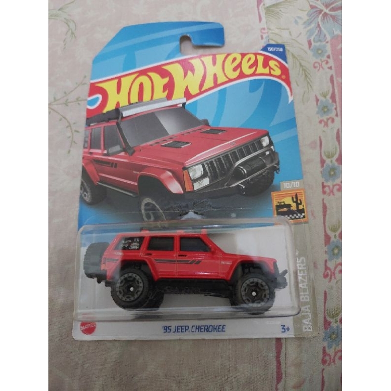 hotwheels jeep cherokee merah