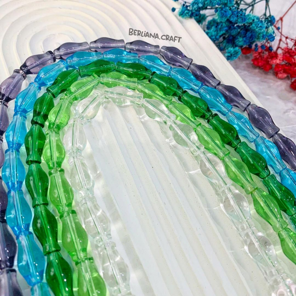 Manik Kaca Bentuk Guci