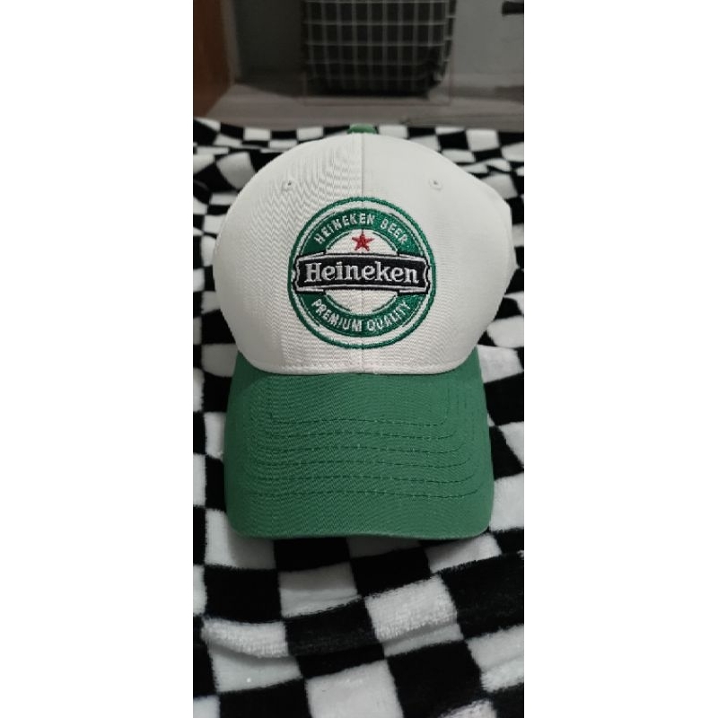 topi heineken preloved