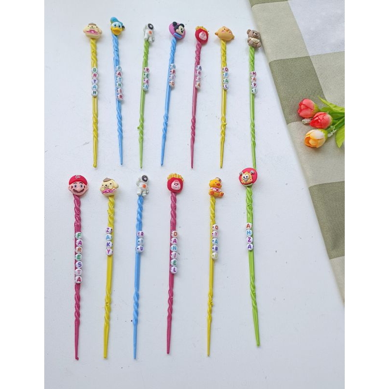 tuding ngaji kancing kayu