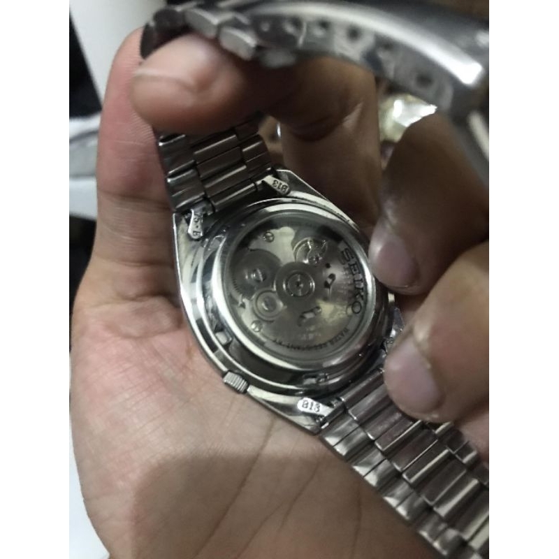 Seiko 5 7s26 white checkerboard dial.