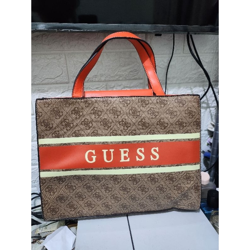 tas guess orange ormay