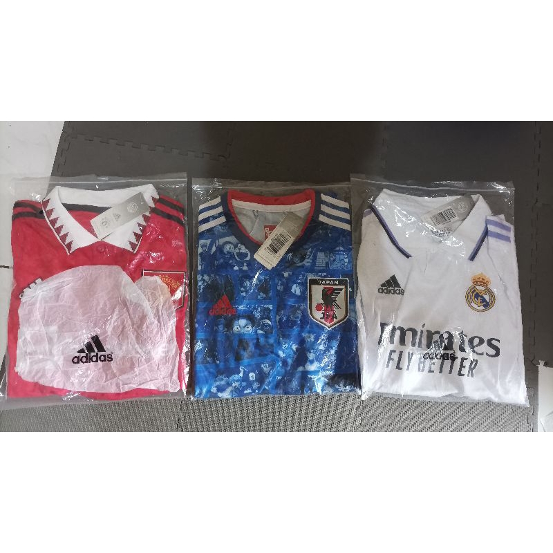 Jersey Manchester United, Jepang anime, Real Madrid Grade Original (Made In Thailand) Size M semua.