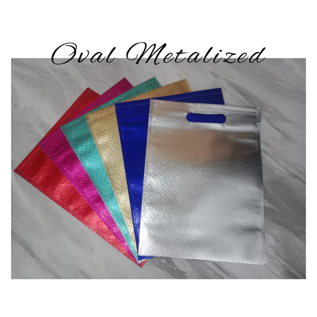 

Tas Shopping Bag Laminasi Metalik Oval / Goodie Bag Laminasi