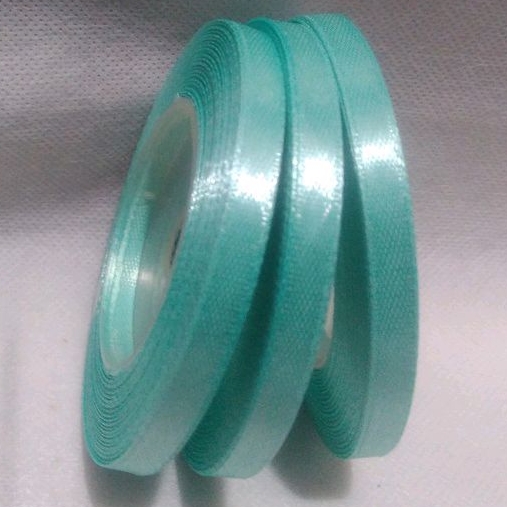 

Pita Satin Hijau Tosca Ukuran 1/4inch Per Roll