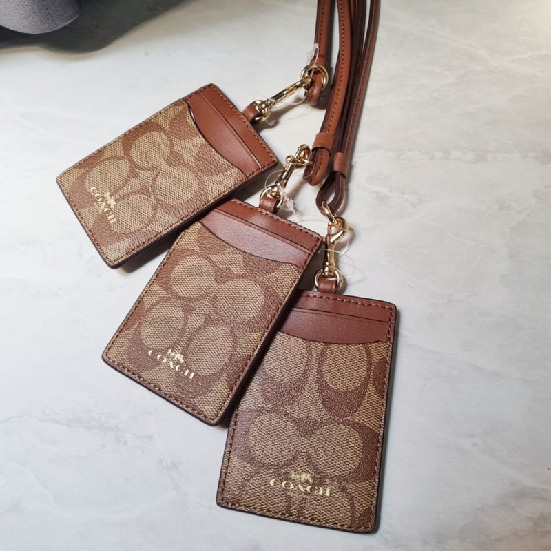 

Coach lanyard id tag sign black brown