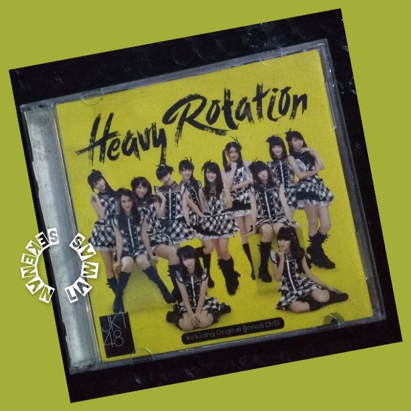CD & DVD JKT 48 - Heavy Rotation /Cover Ada Sedikit Noda