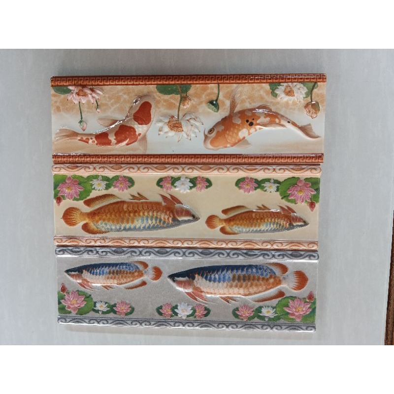 keramik list import keramik list ukuran 8x25 cm motif ikan arwana dan koi