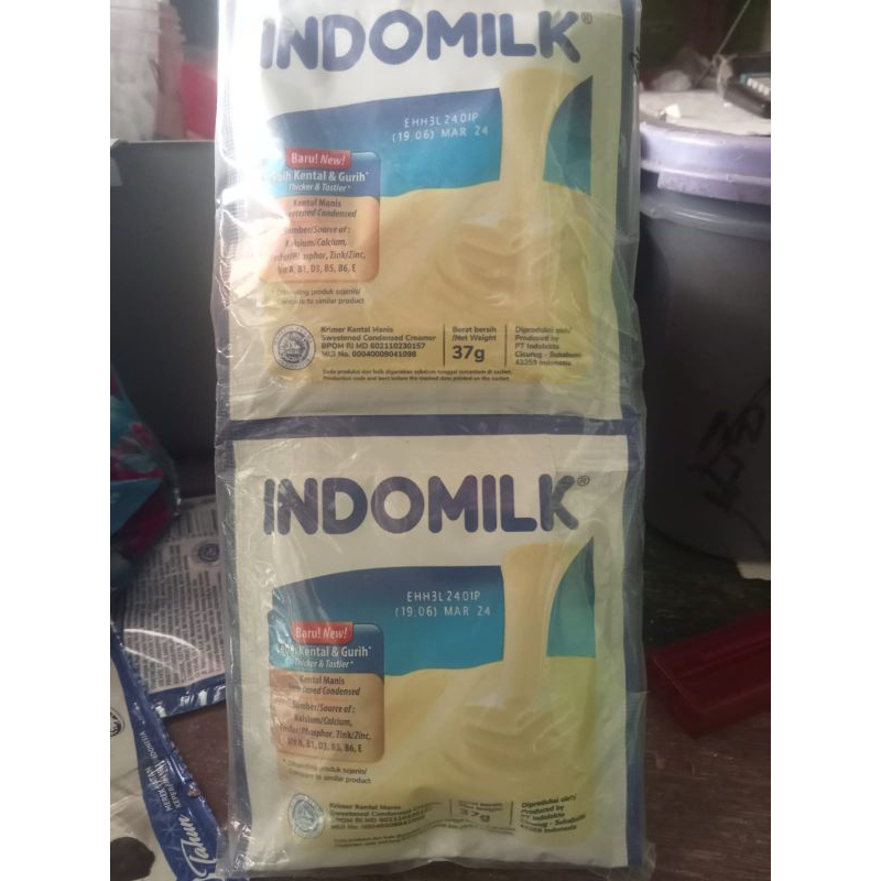

INDOMILK putih 1renteng isi 6