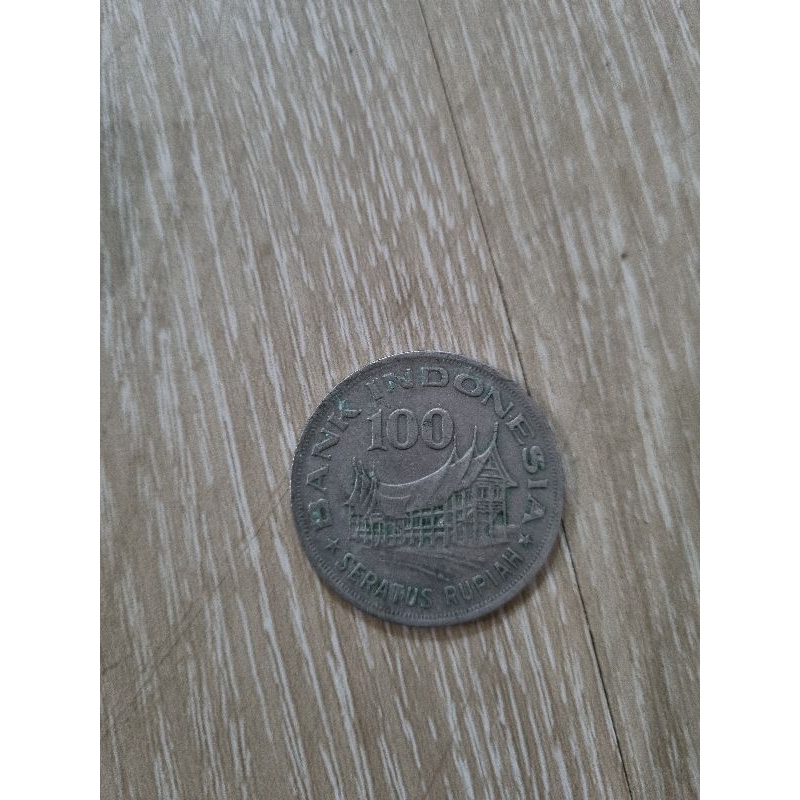 koin kuno 100 rupiah Wayang