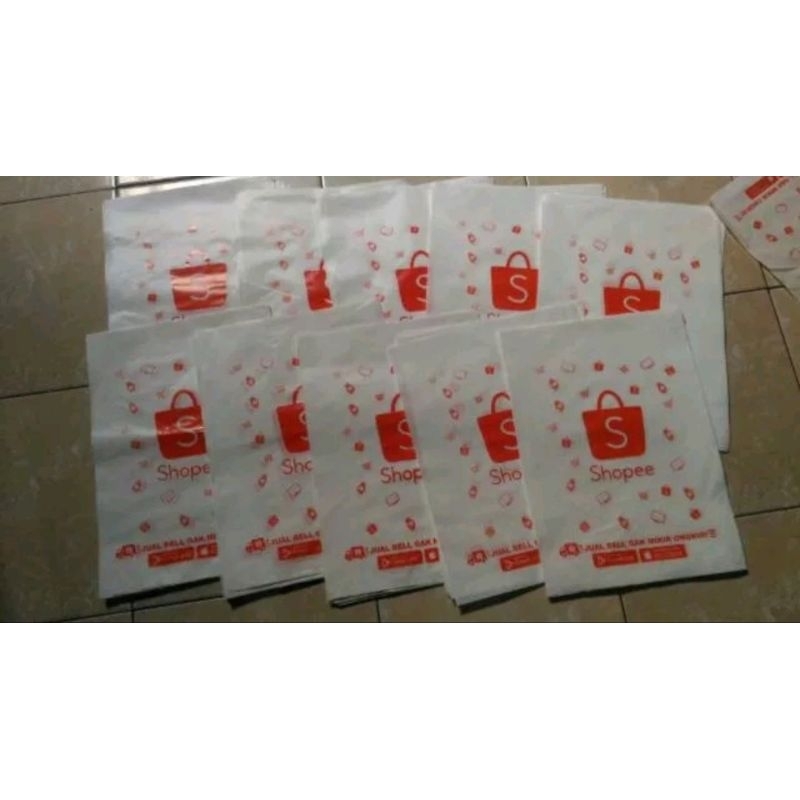 

Plastik Kemasan Bungkus Sablon Shopee ukuran ukuran 30 x 40 cm warna putih tebal