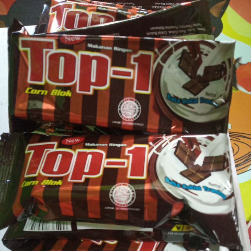 

New TOP-1 1 renceng Snack berhadiah isi 10 pcs (packing kardus)