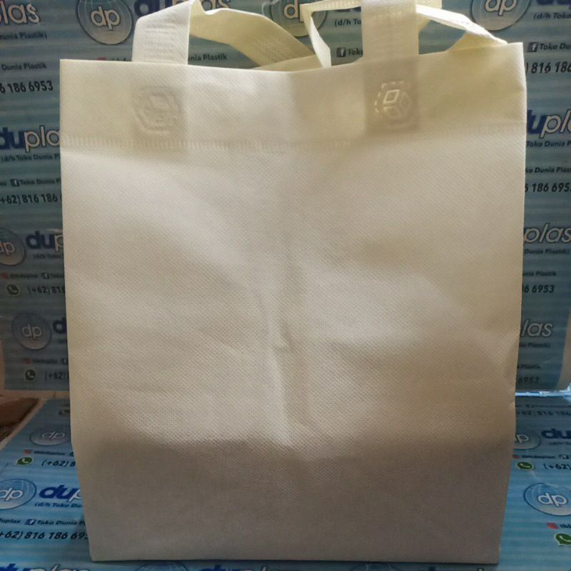 

Tas Handle Kain Spunbond 22 x 26 x 20 cm isi 12 pcs / 1 Lusin