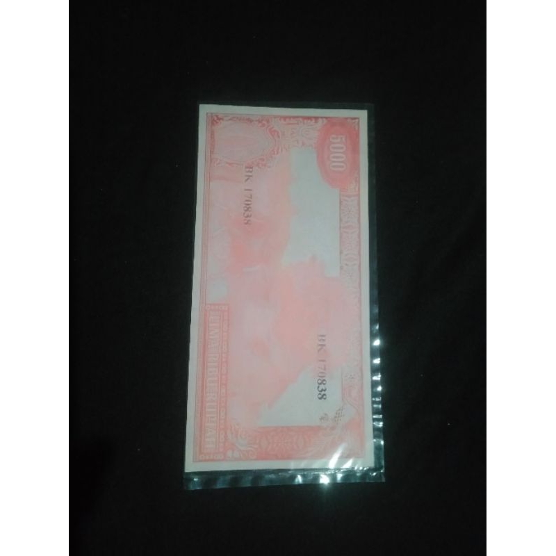 Koleksi Uang Kuno Soekarno Melengkung 1000 Merah Belakang Bajak Sawah