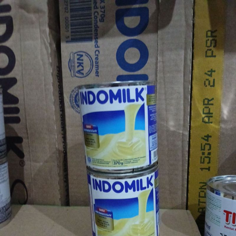 

indomilk kaleng putih