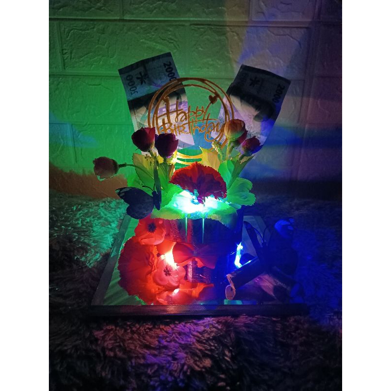 

Money cake pecahan 2rb 23lembar sudah termasuk lampu led