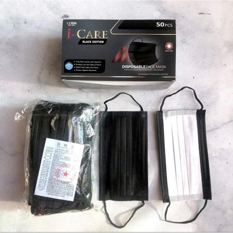 MASKER EARLOP ICARE HITAM DALAMNYA PUTIH ISI 50 pcs