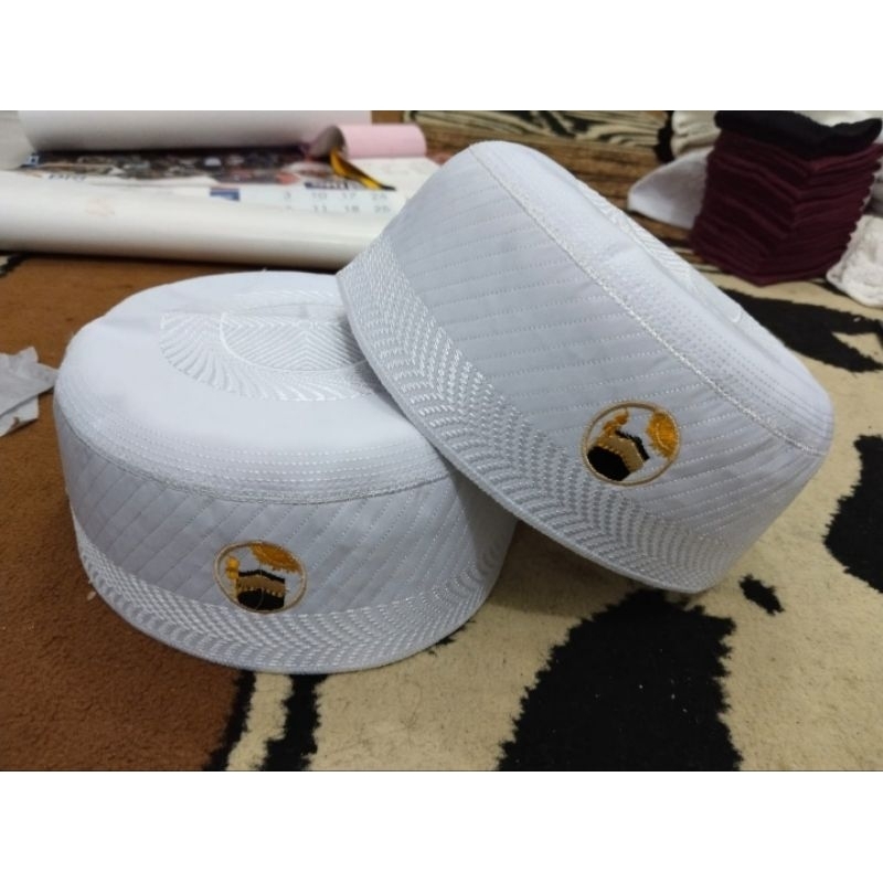 peci madinah ori logo ka'bah