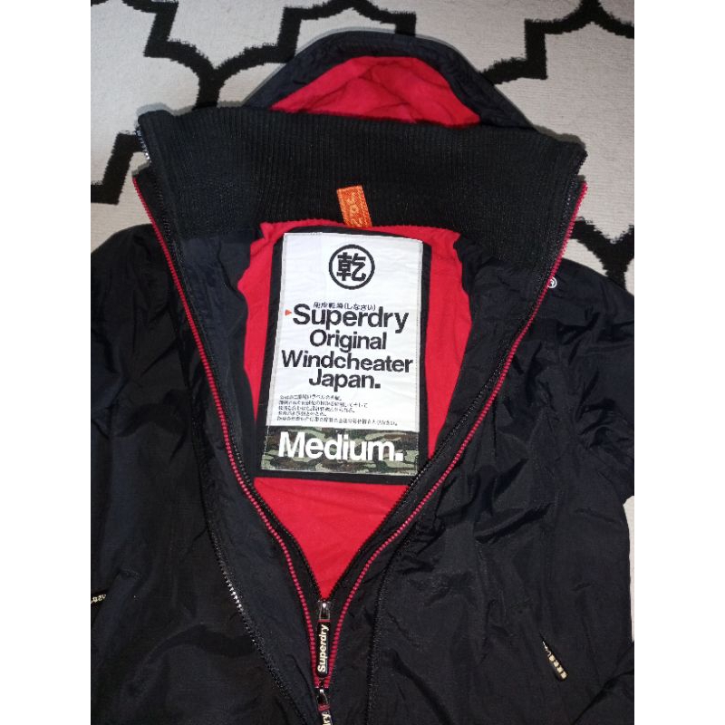 jaket gunung super dry ori second hitam merah