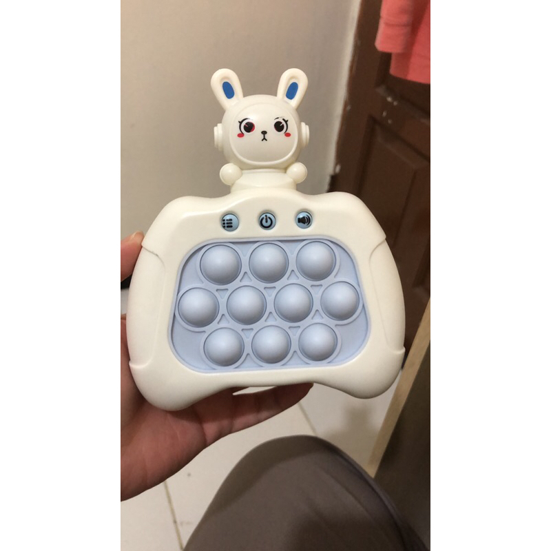 pop it elektrik kelinci biru mainan viral