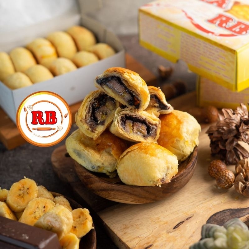 

KUE PIA PISANG COKLAT ISI 10 / PIA RASA PISANG COKLAT / BAKPIA RB PISANG COKLAT