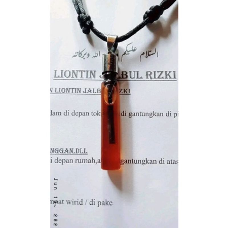 liontin minyak fulus