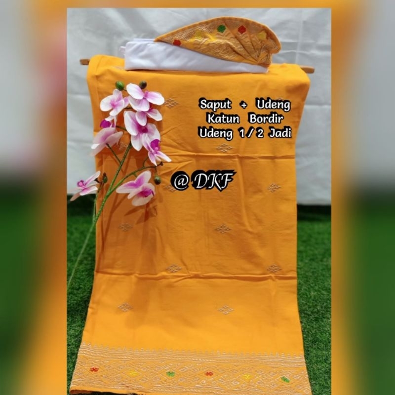 saput kuning udeng putih kuning