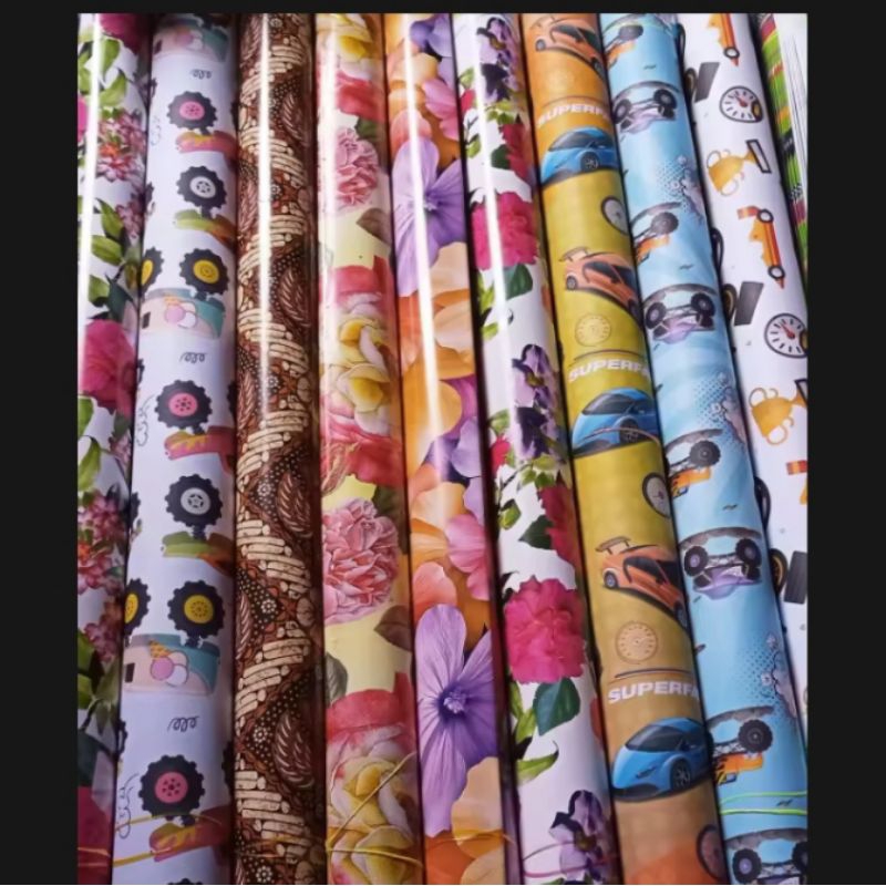 

kertas kado motif karakter SIDU/kiky harga satuan 1 pcs.