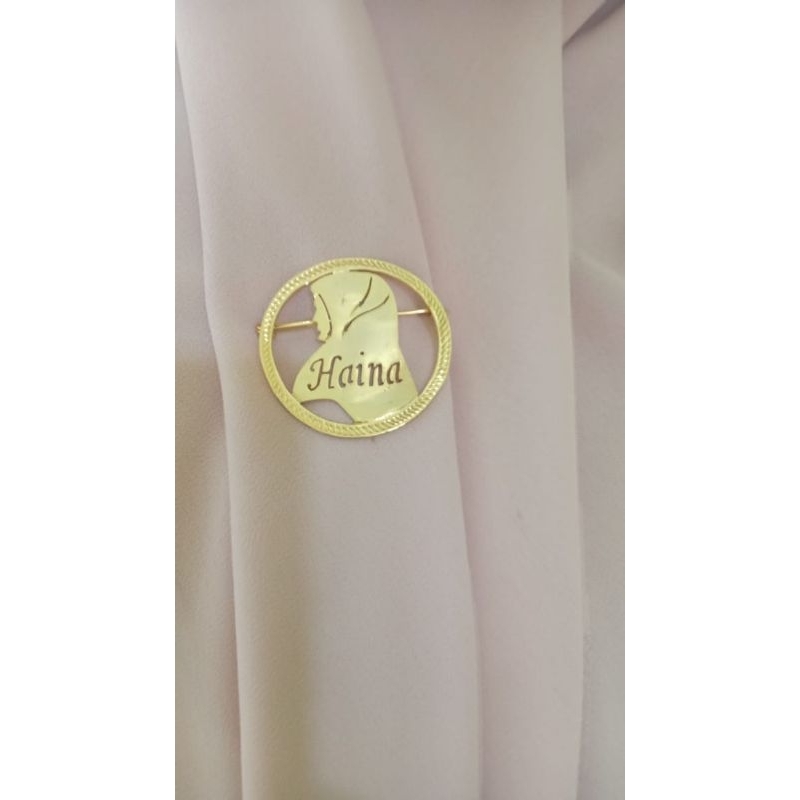 Bros ukir Nama  Motif Lingkaran