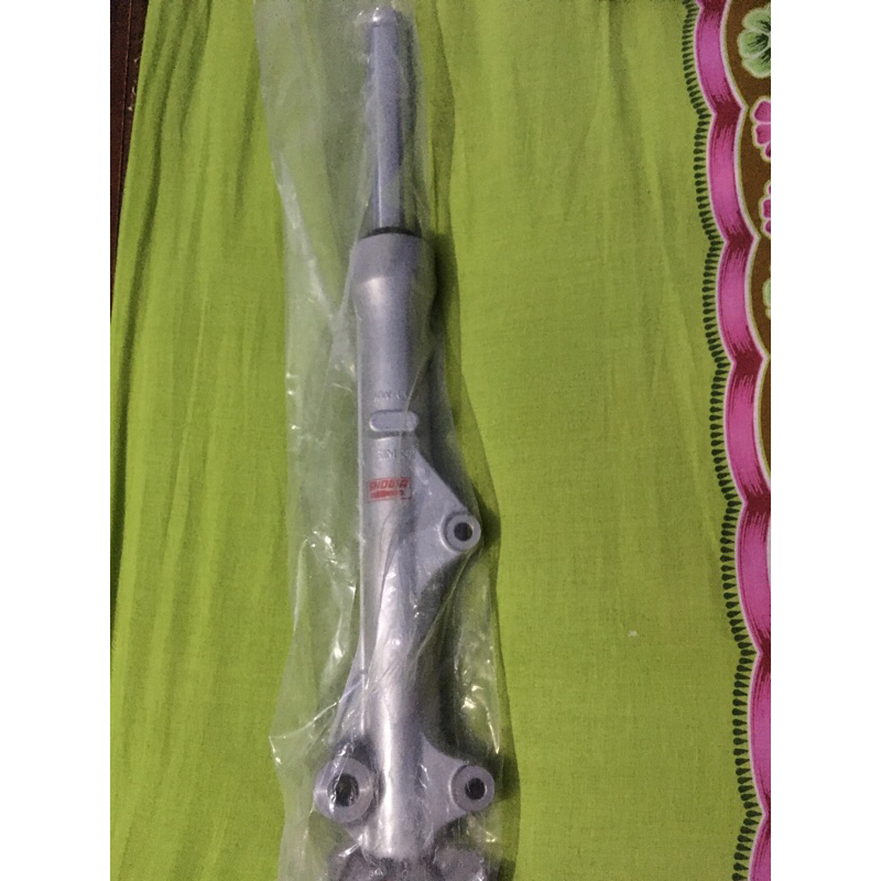 shock depan supra x 125 fi original