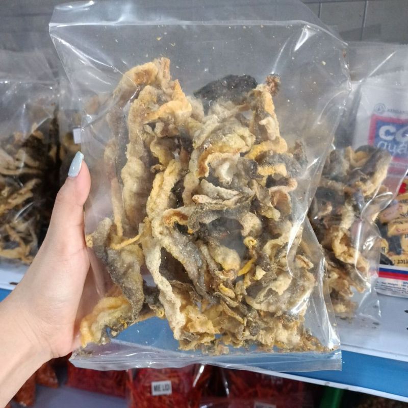 

Ready Medan, Kulit ikan patin/kulit ikan patin premium/kulit ikan/kerupuk kulit ikan 100 gr