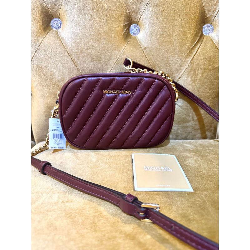 Michael Kors Small oval camera bag