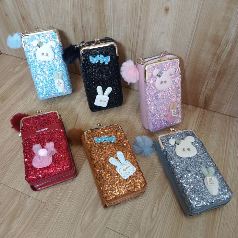 tas slempang hp behel pompom motif payet