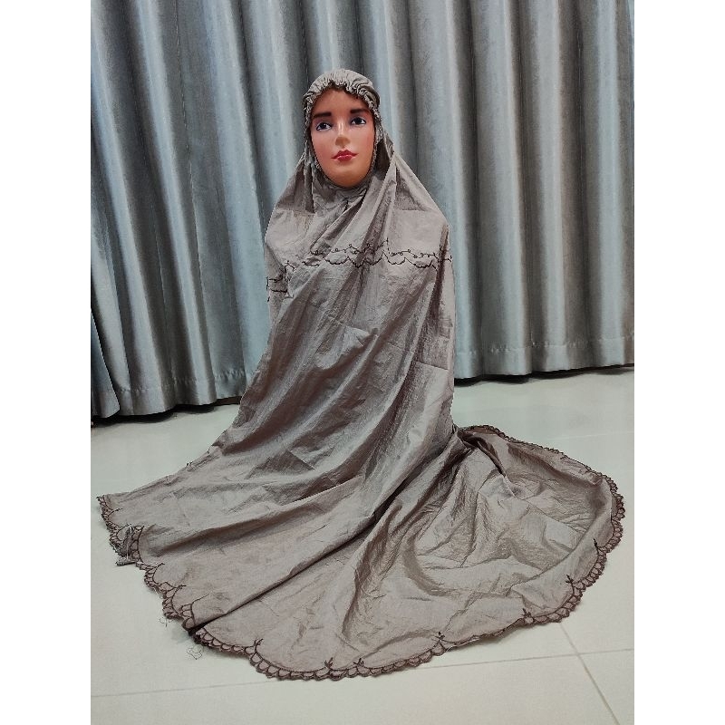 Mukena Parasit