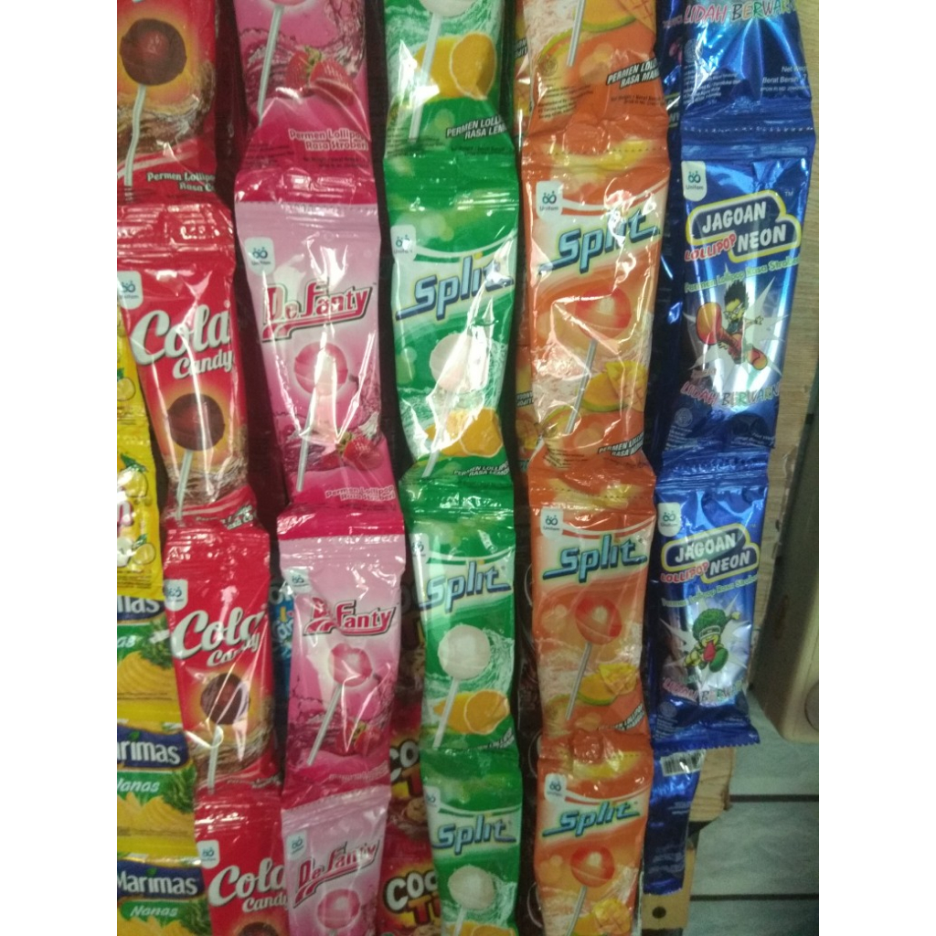 

{ 1 Pack isi 36 biji } PERMEN DeFanty, Split, Jagoan Neon, Cola - Permen lolipop Aneka Rasa