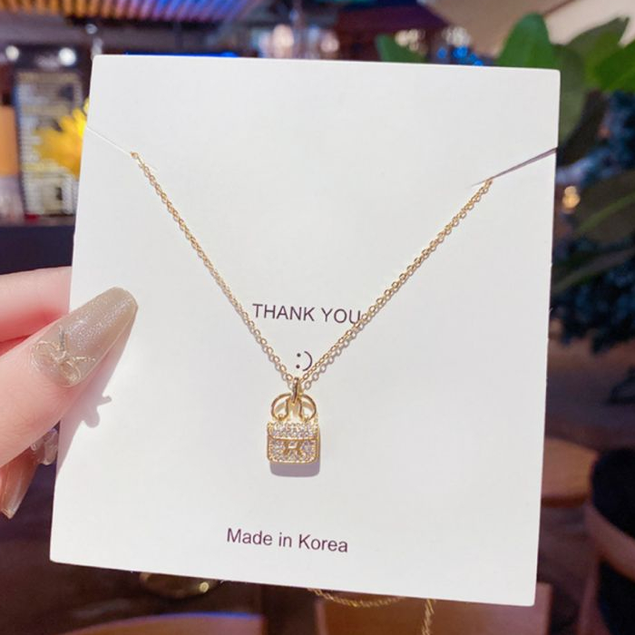 KALUNG LIONTIN TAS WANITA TITANIUM ANTI KARAT